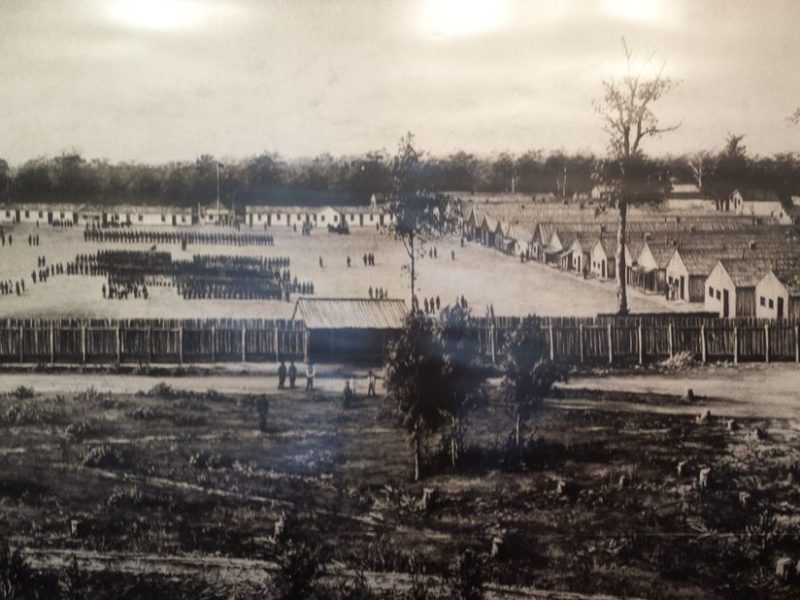 The photograph is of Camp Butler in August 1861. The original is in the Abraham Lincoln Presidential Library and Museum.